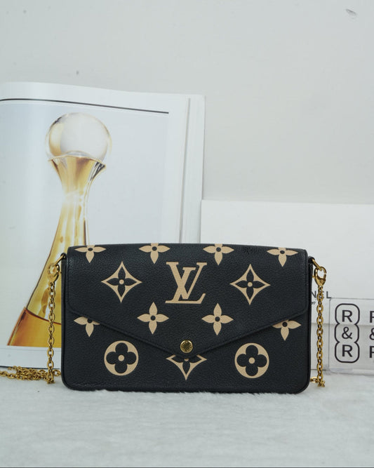 Louis Vuitton Pochette Félicie - Monogram Empreinte Leather - View 1